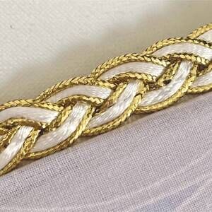 NEW THE HEART KNOT women's golden tail braided bracelet in white